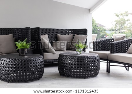Modern Sofa and furniture with pool. Royalty-Free Stock Photo #1191312433
