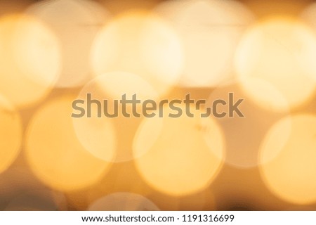 Abstract lights blurred bokeh warm tone color background 