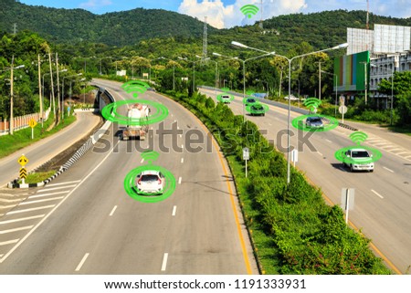 wifi  and car on street  with graphic sensor signal technology concept.