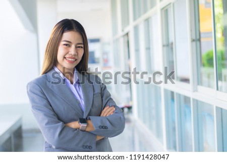 Businesswoman standing with confidence, About business. Royalty-Free Stock Photo #1191428047