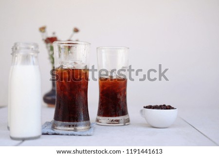 iced coffee with milk and coffee copy space
