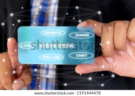 Businessman holding visual smartphone with social media or social network notification icons.