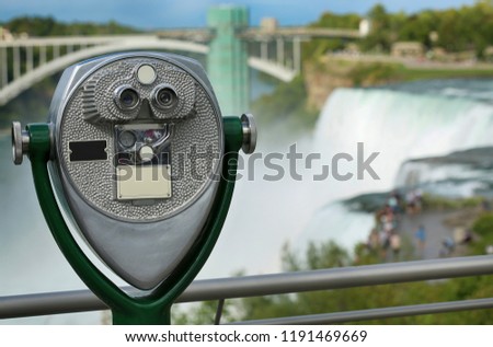 Tourist binocular viewer in Niagara Falls from New York State, USA