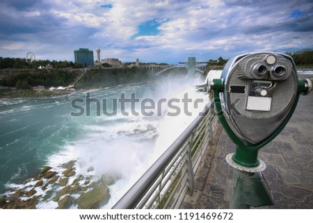 Tourist binocular viewer in Niagara Falls from New York State, USA