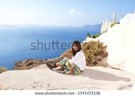 Tourist use remote taking picture with beautiful panoramic view at Santorini(Oia) famous Island at Greece.