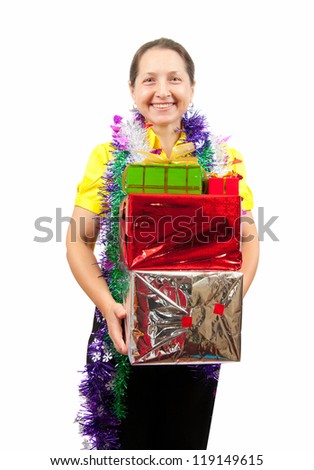 Happy mature woman with Christmas gifts