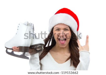Woman with ice skates getting ready for ice skating winter sport activity in Ã?Â?Ã?Â�hristmas santa hat screaming or yelling isolated on a white background