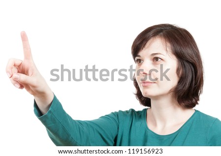 Woman touching an imaginary screen with her finger over a white background