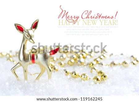 Christmas decorations on snow with space for text