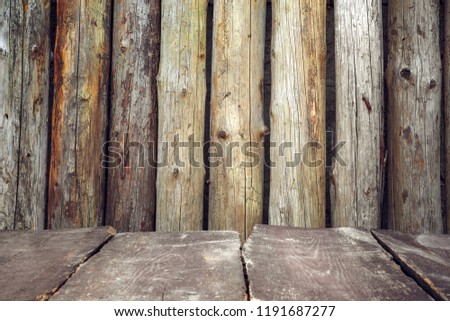Photo of a wall of the house made of wooden logs