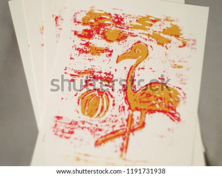 pink and orange flamingo print on paper
