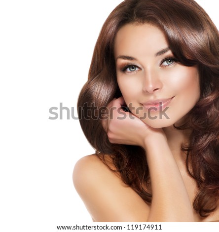 Beautiful Brunette Woman Portrait with healthy Hair.Clear Fresh Skin.Smiling Girl Isolated on a White Background.Skincare.Spa.Beauty Model