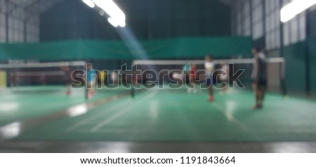 the blured badminton court in asian.