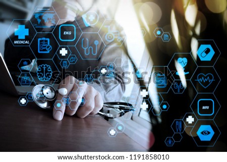 Health care and medical technology services concept with flat line AR interface.Doctor working at workspace with laptop computer in medical workspace office with green plant                           