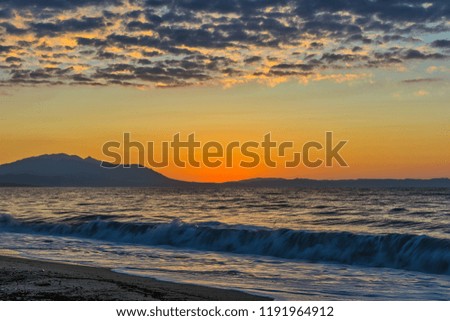 Early morning , dramatic sunrise over sea. Photographed in Asprovalta, Greece