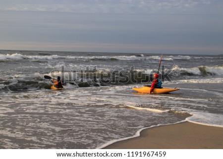 The Baltic coast in autumn, sport in a canoe.