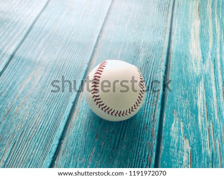 softball on wooden background