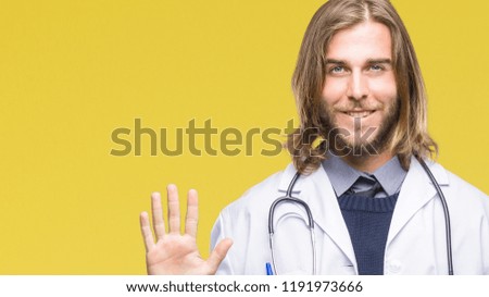 Young handsome doctor man with long hair over isolated background showing and pointing up with fingers number nine while smiling confident and happy.