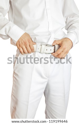 A man in a white suit and white belts isolated on white background