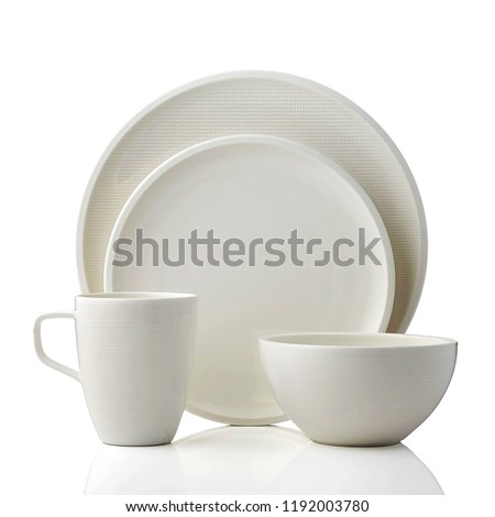 antique white tea cup set. luxury ceramic dishware set on white background, ceramic mug and dish