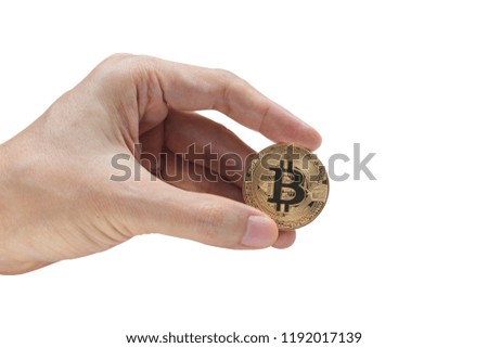 Hand holding bitcoin isolated on white background with clipping path.