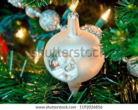 Christmas tree decorated with glitter, lights and glass balls for the Christmas and New Year celebrations