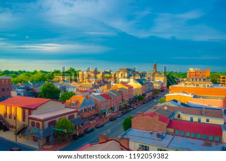 aerial view of suburban downtown with sunny blue sky and warm sunlight on sunny day in Summer - West Chester, Pennsylvania USA Royalty-Free Stock Photo #1192059382