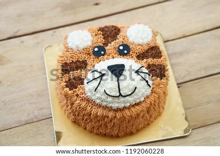 Tiger Birthday cakes with afternoon tea set on white background