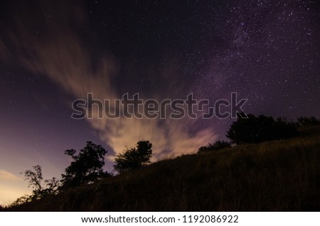 beautiful clouds with stars in the night and nature