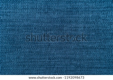 Blue fabric texture. Abstract background, empty template. Top view.