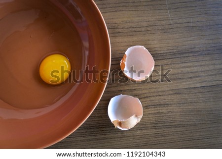 Cook the raw eggs on a healthy table.