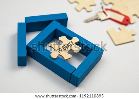 Model  house made from wooden block and wooden puzzle with text probate on white background. Property and mortgage concept. Royalty-Free Stock Photo #1192110895