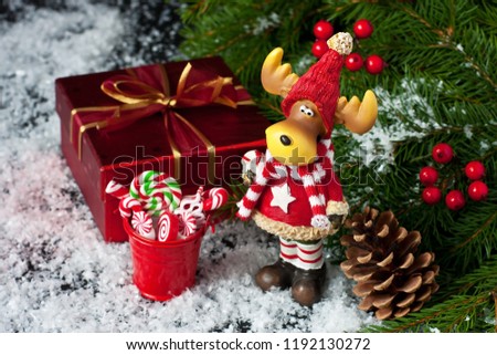  Christmas gift box with decoration.Christmas still life with bright symbols