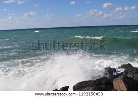 
The waves are hitting the rocks