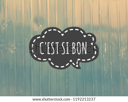 Inspirational positive quote with warm tone blue zinc background. "it is so good" in french