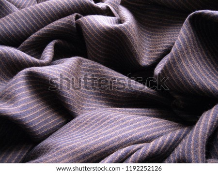 Woolen fabric. Texture of fabric. Textile background.