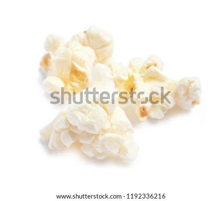 Delicious salty popcorn on white background