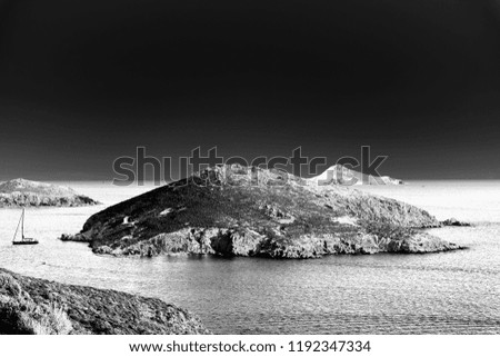Solarized photograph of an island in Aegean sea in Patmos, Greece
