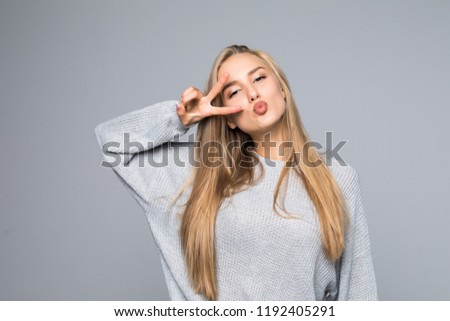 Open mouth people person entertainment concept. Close up portrait of playful excited funny joyful positive optimistic with toothy smile girl showing v-sign isolated on gray background copy-space