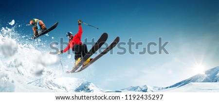 Skiing. Snowboarding. Extreme winter sports. Royalty-Free Stock Photo #1192435297