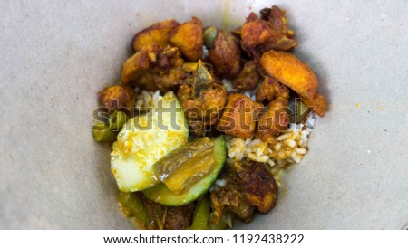Famous dish from Kelantan,Malaysia known as nasi kak wok Royalty-Free Stock Photo #1192438222