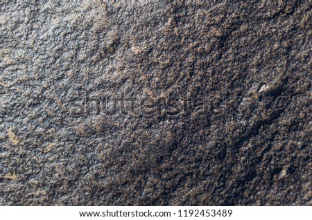 Texture of black natural stone.