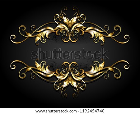 Symmetrical, patterned gold frame scroll on black background.