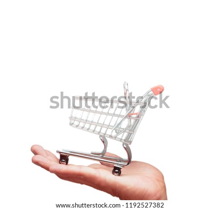 isolated male hand holding a shopping cart