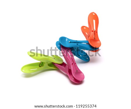 Four colored clothespin isolated on white background