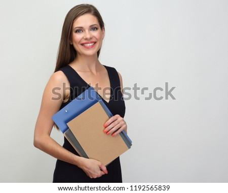 Woman accountant in black dress holding business paper. One smiling female person isolated portrait.