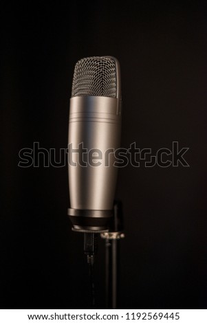 studio microphone on black background