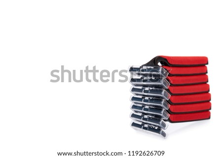 Red disposable shaving razor isolated on white background, copy space template