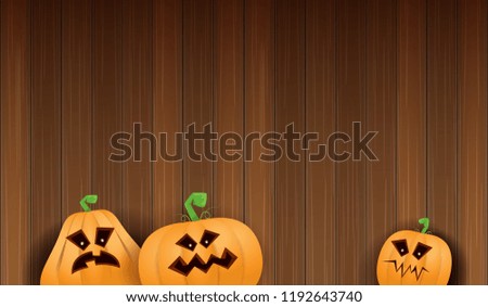 Halloween Horizontal web Banner or poster with Halloween scary pumpkins isolated on wooden wall background. Funky kids Halloween background with space for text