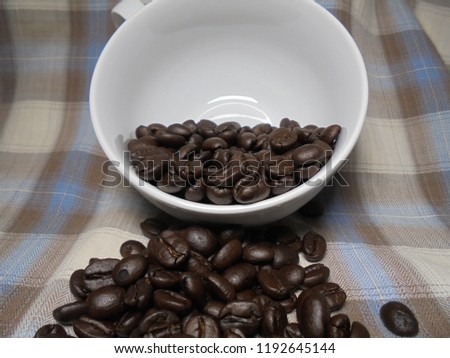 Coffee and coffee beans on fabric